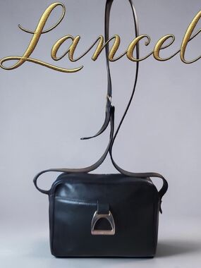 LANCEL Black VTG Leather Crossbody Bag with Signature Stirrup Detail In EUC